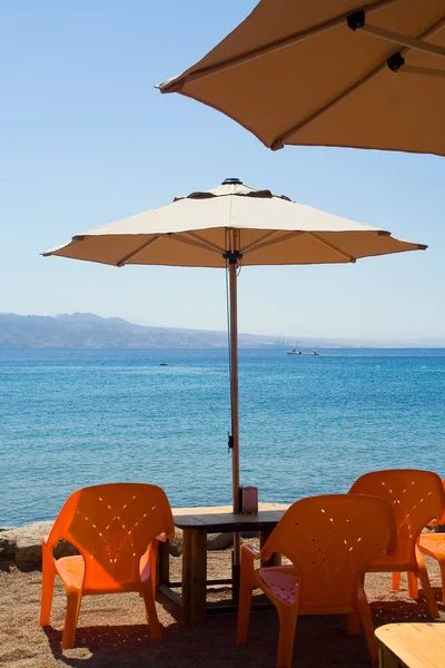 stock image Summer cafe on the sea beach.