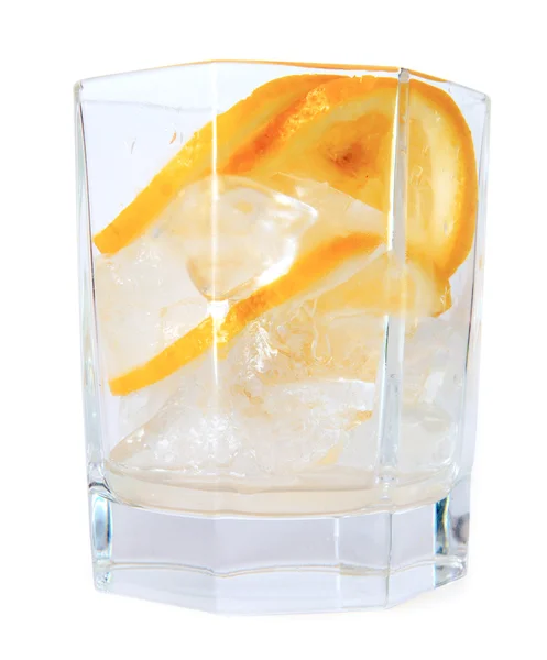 Glass with fizzy liquid and orange slice — Stock Photo, Image