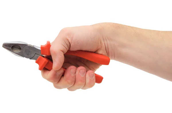 Red combination pliers held in hand — Stock Photo, Image