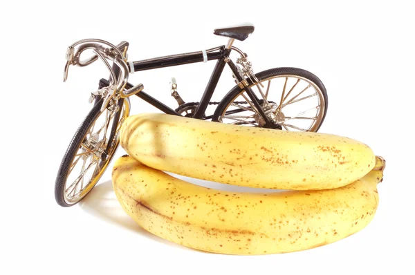 Toy bike and bananas — Stock Photo, Image