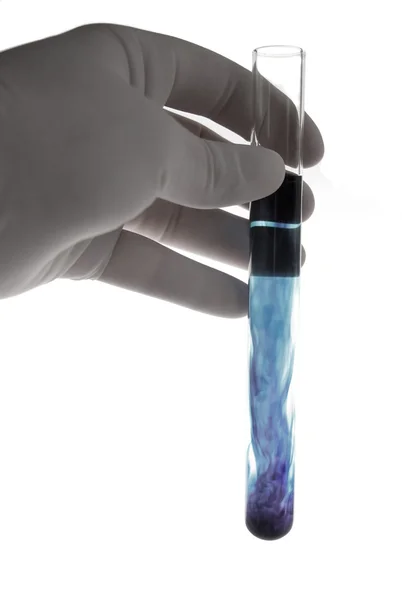 Hand holding laboratory tube — Stock Photo, Image