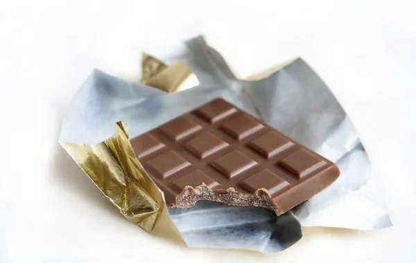 Bitten bar of chocolate — Stock Photo, Image
