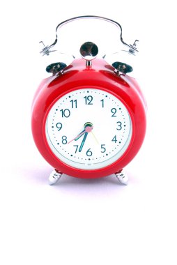 Red alarm clock on white background clipart