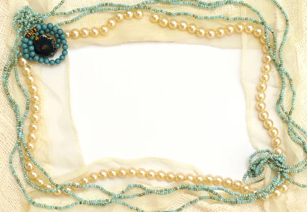 Frame of lace and jewelry: pearls — Stock Photo, Image