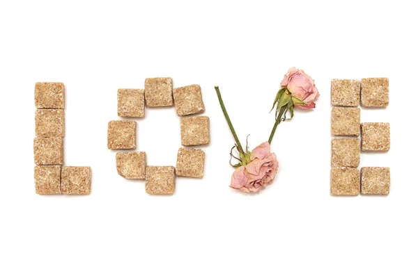 Κείμενο αγάπη τριαντάφυλλα και ζάχαρη από ζαχαροκάλαμο — Φωτογραφία Αρχείου