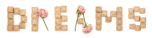 Text dream of roses and cane sugar — Stock Photo, Image