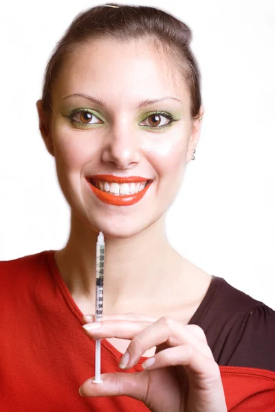 The girl with a syringe — Stock Photo, Image