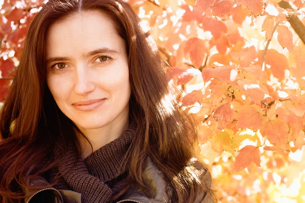 stock image A woman in the autumn season