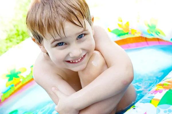 stock image The teenager in inflatable p