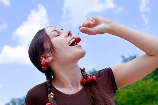 The young woman with cherry — Stock Photo, Image