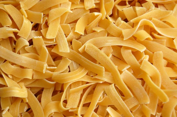 Tagliatelle pasta background — Stock Photo, Image