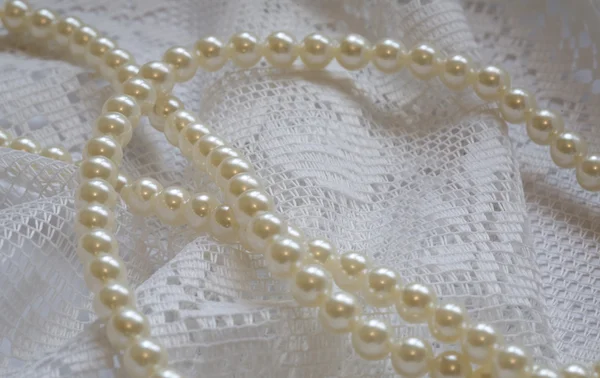 Pearls and lace — Stock Photo, Image
