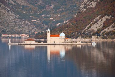 Church on rocks in Perast, Motenegro clipart