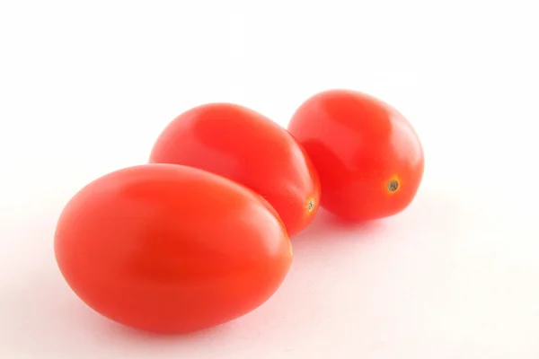 Tres tomates bebé — Foto de Stock