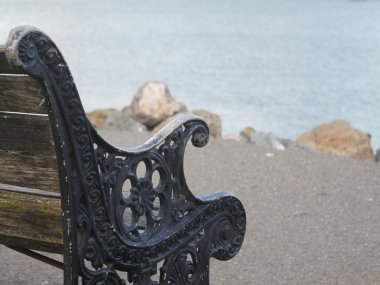 Old wooden bench on the wharf clipart