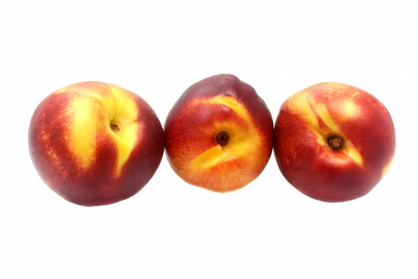 Three nectarine on white background — Stock Photo, Image