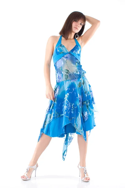 Meisje in blauwe jurk met hand omhoog — Stockfoto