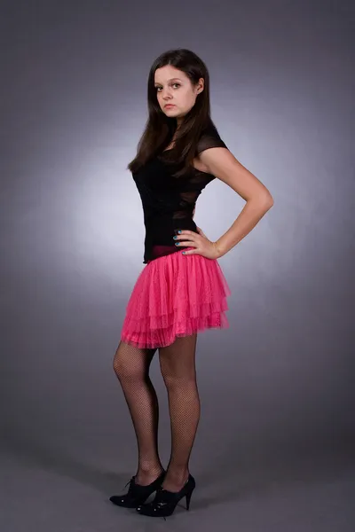 Girl in a skirt and pantyhose — Stock Photo, Image