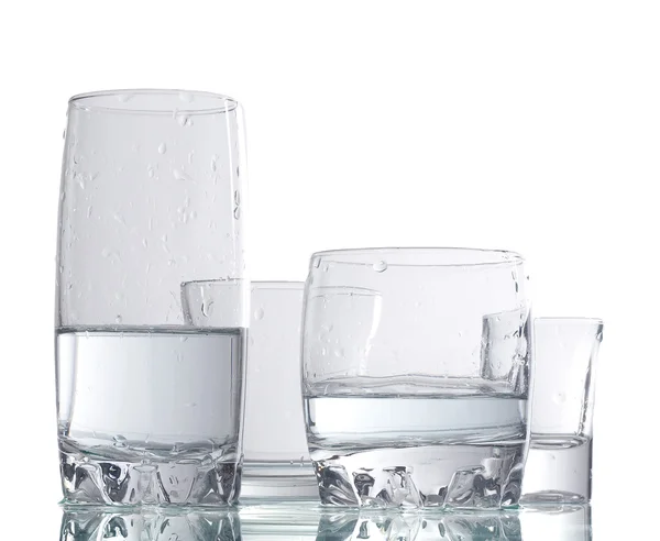 Four cups of liquid — Stock Photo, Image
