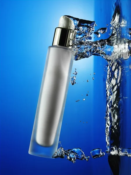 stock image Bottle from the water in motion