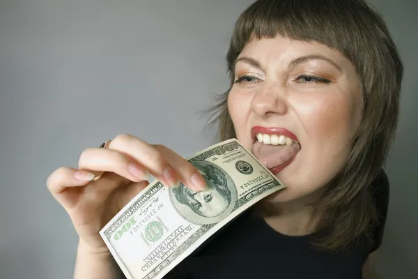 Bizarní žena. chuť peněz. — Stock fotografie