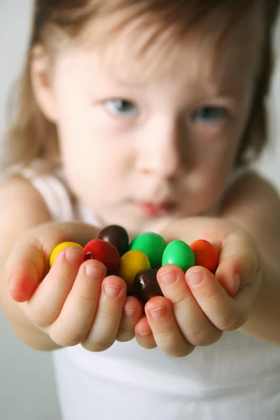 stock image Small girl the hands the candies