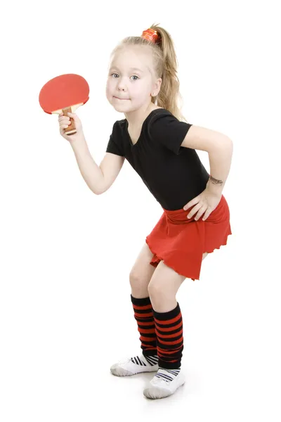 Holčička hraje ping-pong. — Stock fotografie