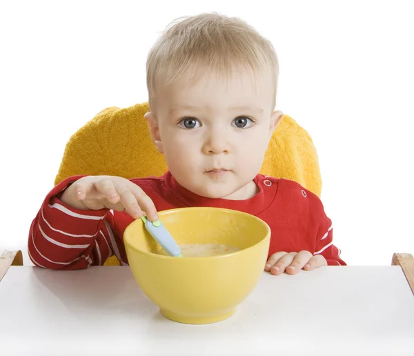 Chłopiec jedzenie śniadanie — Zdjęcie stockowe