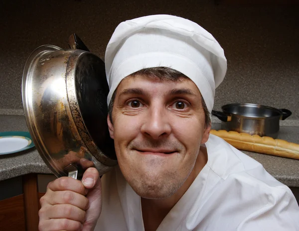 Cozinheiro assustador na cozinha — Fotografia de Stock