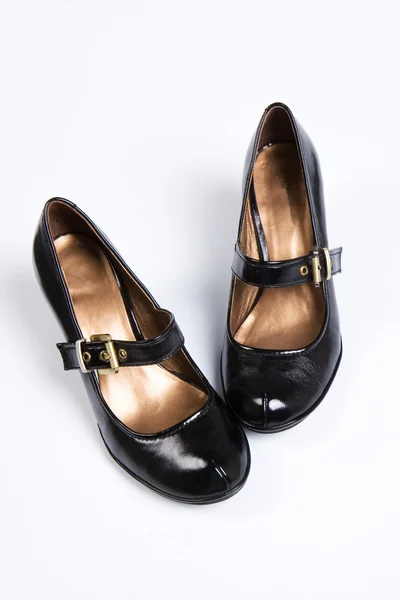 The female black varnished shoes — Stock Photo, Image