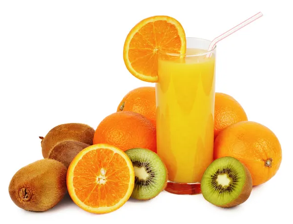 Glass of juice and tropical fruits — Stock Photo, Image