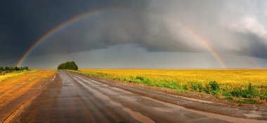 Rainbow over road clipart