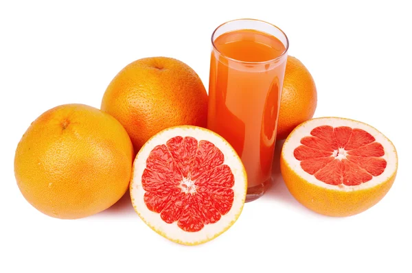 Glas Saft und Grapefruits — Stockfoto