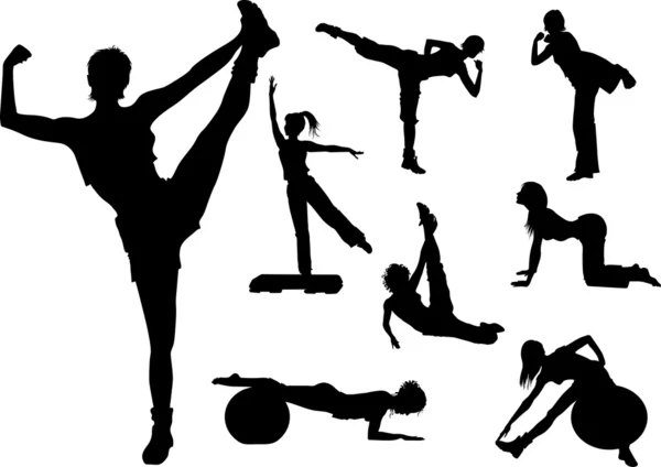Силуэты фитнес-женщин — стоковый вектор