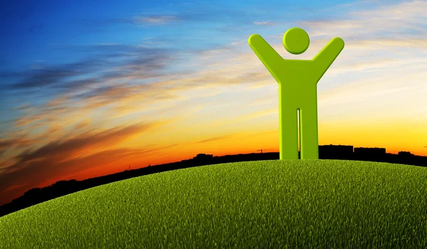 Zielony symbol człowieka stojącego na zielonej ziemi — Zdjęcie stockowe