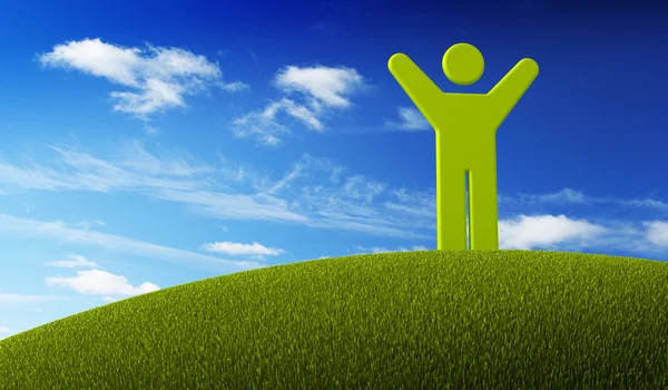 Зеленый символ человека, стоящего на зеленой Земле — стоковое фото