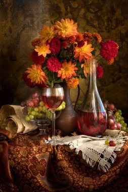 Still life with autumn flowers, grapes and wine clipart