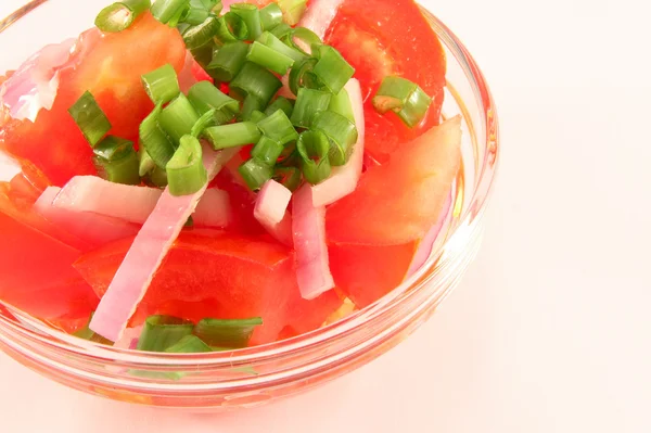 Salada de tomates e cebolas Imagem De Stock