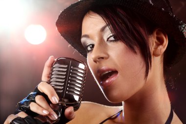 Singer with the retro microphone clipart