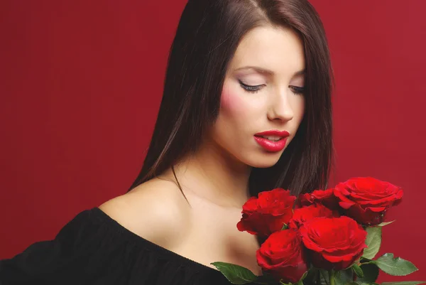 Жінка з трояндами — стокове фото
