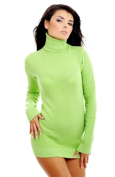 Beautiful woman wearing green sweater — Stok fotoğraf