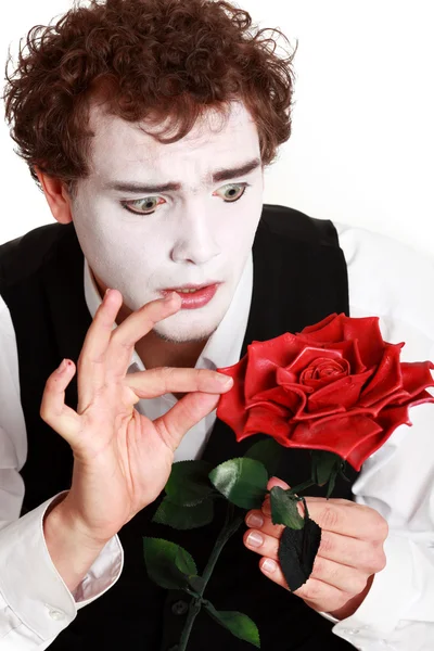 Μίμος κρατώντας ένα τριαντάφυλλο , — Φωτογραφία Αρχείου