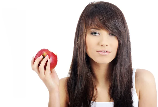 Frau isst roten Apfel. — Stockfoto