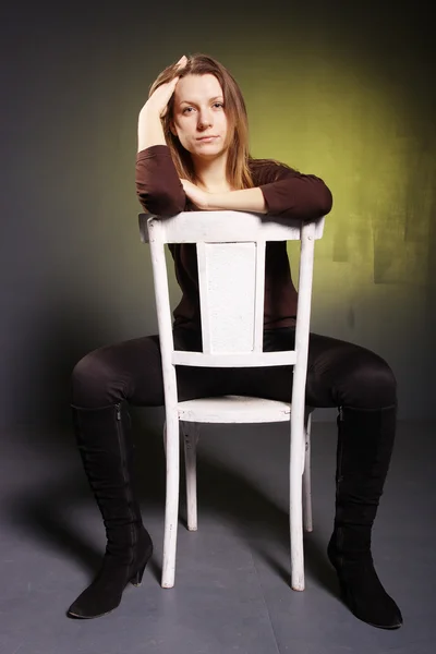 Girl and chair — Stock Photo, Image