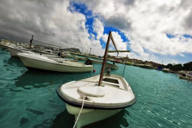 Boats near the pier clipart