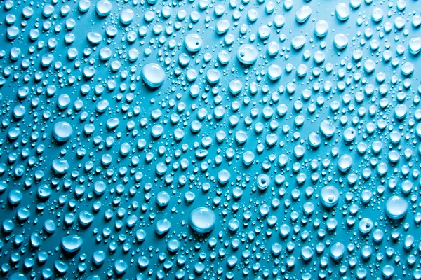 Gotas de água azul — Fotografia de Stock