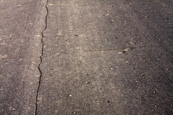 Fundo de asfalto rachado — Fotografia de Stock