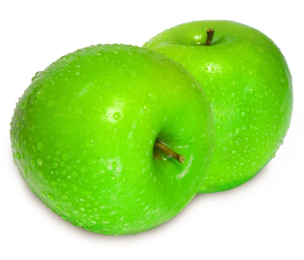Два свежих зеленых яблока с каплями воды о — стоковое фото