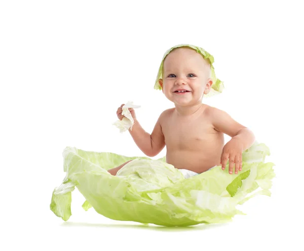 Dítě v zelí — Stock fotografie