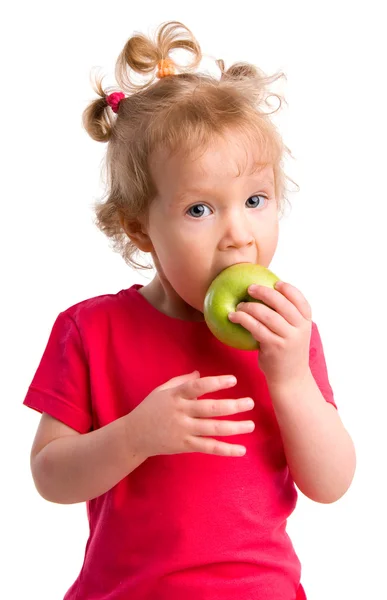 Kız bir elma yiyor. — Stok fotoğraf